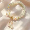 Pulseira de Cristal com Contas Estilo Chinês para Mulheres Flor Retro High-End Transmissão ao Vivo Ponto Turístico Vendedor de Rua Venda Quente Ornamento de Mão Atacado