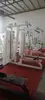 Máquina de Agachamento Hake Equipamento de Treinamento de Força para Mulheres Tipo Abrangente Treinamento em Casa Função Abrangente de Fitness Muitos Equipamentos