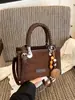 Bolso de mano vintage para otoño e invierno para mujer 2026 nuevo bolso cuadrado pequeño de gamuza esmerilada con una textura elegante, bolso de hombro y cruzado