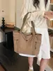 Nova bolsa tote simples de grande capacidade transfronteiriça, bolsa de mão casual e moderna, bolsa de ombro versátil para trabalho e deslocamento