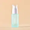 Veta plateada En stock 30 ml Botella redonda recta para base de maquillaje, Botella de vidrio para cosméticos con logotipo personalizable, Botella para loción