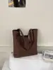 Bolsa de Gran Capacidad para el Hombro para Viajes Transfronterizos de Mujeres 2026 Nuevo Estilo Coreano Moda de Nicho Bolso de Mano Tejido