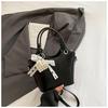 Bolso de cubo popular de este año para mujer 2025 nuevo bolso de mensajero de nicho de alto valor bolso de hombro de moda para ir al trabajo