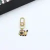 Colgante de gatito de aleación estilo japonés Llavero de coche mini Colgante para AirPods Accesorio para bolso pequeño Regalo