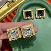 Plaza Fan Jia Diamante de Alta Calidad Chapado en Oro Transfronterizo Más Vendido Joker Lujo Ligero Retro de Alta Calidad Pendientes S925 Lote