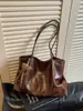 Bolso de axila retro de alta gama de gran capacidad para mujer, nuevo bolso de hombro de moda 2026 para commuting, bolso de mano tipo tote, moderno