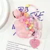 Colgante Acrílico de Arena Movediza Infundido con Aceite de Garra de Gato Adornos Pequeños Cuentas de Colores Flotantes Lindo Soñador Colgante para Mochila de Niña