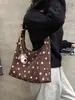Colección de otoño 2026 transfronteriza: diseño único, gamuza de lunares, bolso de hombro color block, bolso de axila moderno y retro