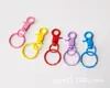 Una variedad de peluches hebilla colgante color hebilla de perro hebilla de pinza anillo de tarjeta de pintura hebilla de perro color apertura de pintura hebilla de gancho hebilla de puerta