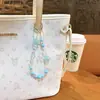 Sinfonía Creativa Estrella Pequeña Cadena para Teléfono Móvil con Cuentas Llavero Colgante Lindo para Bolsa Llavero de Coche Regalo Venta al por Mayor