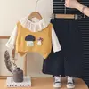 Conjunto de Chaleco de Punto de Dibujos Animados para Bebé Niña Otoño 2026 Nuevo Elegante Moderno Casual Conjunto de Tres Piezas para Principios de Otoño