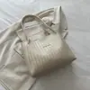 Bolso de hombro de moda para mujer de gran capacidad, estilo coreano, retro, casual, para el trabajo, el día a día, bolso tote tejido versátil, 2026