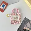Bolsa para Auriculares Pequeña Fresca Floral Estilo Coreano Mini Diseño de Nicho Bolsa de Almacenamiento Anti-Caídas y Anti-Rozaduras Cubierta Protectora para Auriculares Bluetooth