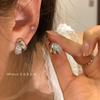 Aretes de mujer más vendidos 2025, nicho de alta gama, temperamento de lujo ligero, aretes de circonita, aretes de aguja de plata 925 al por mayor