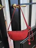 Bolso de axila de moda y chic estilo francés, bolso de cuerno elegante y único, nuevo modelo 2026, alto valor estético, bolso de mano simple y casual para mujer