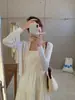 Cardigan de Tricô com Decote V Protetor Solar de Seda de Gelo Realçador de Branco para Mulheres, Estilo Fino de Verão, Adequado para Combinar com Vestidos de Alça, Peças de Exterior ou como um Top sem Mangas, Preto