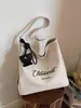 Bolsa de Lona Bordada Casual Feminina Grande Capacidade Ombro Único Bolsinha de Balde para o Dia a Dia Versátil Aluno Sala de Aula Transversal Tote Bag