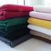 Tela de pana abrigo de pana ropa camisa overol sofá tela de pana de seda tela de color sólido procesamiento de liquidación