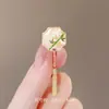 Novo broche estilo antigo de alta qualidade ins para mulheres estilo chinês leque borla pino de terno placket de pressão cheongsam corsage atacado