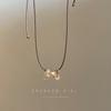 Collar con colgante de perla y lazo para mujer, estilo retro, otoño e invierno, largo, de lana, con cadena, nicho, accesorios de cuerda de cuero de alta gama.