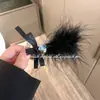 Pinza para el pelo de estrella de plumas negras súper de hada para mujer, flequillo lateral, alto sentido, celebridad de Internet, pinza de clip todo en uno, tocado, accesorios para el cabello