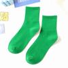 Venta directa de fábrica de calcetines de primavera con explosiones de colores sólidos japoneses de color caramelo para mujer, calcetines de colores de marea, venta al por mayor