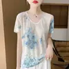 Nuevo top de verano de manga corta con estampado floral y cuello en U, diseño de patchwork floral, estilo coreano, top de mujer moderno y versátil