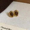 Pendientes de Borla con Piedra Ojo de Tigre Redonda Aguja Plateada Pendientes de Botón Vintage Retro Pendientes Versátiles de Lujo Ligero para Mujer