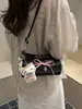 2026 Verão Novo Estilo Exquisite Bolsa de Mão com Laço Feminina Bolsa de Ombro Transversal Pingente Fofo Atacado Bolsa Feminina