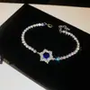 Pulsera de flor redonda con cierre de circonita, lujo ligero, alta gama, pulsera exquisita con un diseño elegante, versátil y a la moda, venta al por mayor