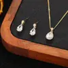 Conjunto de Venda Quente Transfronteiriça de Brincos e Colares de Duas Peças Atacado Moda Europeia e Americana Corrente de Clavícula de Luxo Leve Brincos