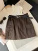 Saia de trabalho retrô com múltiplos bolsos para mulheres, novo design de outono, saia curta casual bodycon de cintura alta afunilada em A