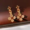 Brincos e colar florais estilo vintage europeu e americano cravejados com diamantes azul turquesa, corrente para clavícula de luxo discreto, conjunto de joias de alta qualidade