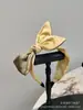 Nova Faixa de Cabeça de Tecido Xadrez com Aba Larga e Nó Estilo Coreano para Circunferência Craniana Grande Venda por Atacado