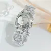 En Stock Transfronterizo Lujo Ligero Cuadrado Reloj de Pulsera de Cuarzo para Mujer con Números Romanos, Aleación de Oro, Reloj de Moda para Mujer al por Mayor
