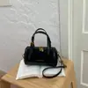 Colección de otoño 2026 transfronteriza: nuevas bolsas tipo almohada para el commute, de estilo coreano, modernas y populares, bolsos tote de moda, bolsos de hombro y bolsos cruzados para mujer