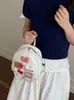 Peluche de Gato Minimalista y Lindo con un Pequeño Bolso, Mochila Modelo Nuevo 2026 para Viajes Diarios y Uso Versátil