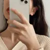 Pendientes de Clip Retro Europeos y Americanos de Gama Alta Minimalistas Versátiles Microincrustados con Circonita Diseño de Nicho Pendientes Asimétricos Brazaletes para Orejas Anillos para Orejas