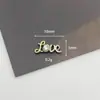 Novos materiais DIY de joias para unhas em liga urso punk trevo de quatro folhas acessórios personalidade brinco de inglês joias