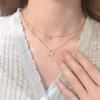 2023 caliente al por mayor amor collar de mariposa de alta gama estudiante corazón a corazón estampado regalo para novias cadena clavicular