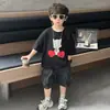 Traje de Verano con Dibujos Animados de Manga Corta para Niños 2026 Nuevo Estilo Shorts de Mezclilla Elegantes para Niños Conjunto Casual de Dos Piezas para Bebé Niño