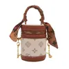 Bolso Transfronterizo para Niños Otoño e Invierno Nuevo Moda Europea y Americana Letra Mini Bolso Cilindro Exquisito Bolso Cruzado de Cadena para Niñas Moderno