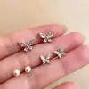 Set de Aretes de Mariposa Xiaohongshu, Lujo Ligero, Nicho, Clavos para Hélice de Oreja de Gama Alta, Joyería para Orejas, Aretes Estilo Nuevo 2026 para Mujeres