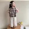 Conjunto sin mangas para niña 2026 Nuevo Verano Ropa Infantil Chaleco a cuadros Conjunto de dos piezas Ropa para bebé niña Delgado Estilo moderno