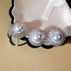 Pendientes de perlas de circón flash lujo ligero anillo de perlas ajustable cuentas de concha moda para ir al trabajo Joker traje mujer al por mayor