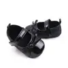 Directo de fábrica PU bebé brillante moda lazo niña pequeña zapatos de cuero zapatos para niños pequeños BHX3060
