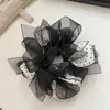 Goma para el pelo de lunares en blanco y negro estilo retro coreano con un toque de alta gama, Nuevo coletero de malla con lazo, Cuerda para el pelo nueva y moderna