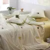Juego de Cuatro Piezas de Lujo Ligero Clase A de Tencel Lenzing Bordado Floral con Borde Ancho Juego de Cama de Seda Helada para Verano