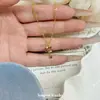 2026 Colgante de Collar con Llave de Diamante Brillante Amor Cruzado Europeo y Americano Colgante de Llave Arcoíris Cadena de Clavícula para Mujer Estilo Niche de Lujo Ligero Adorno
