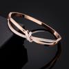 Joyería transfronteriza europea y americana pulsera de lazo de pedrería hecha a mano acero de titanio hebilla de oro de 18K pulsera abierta de oro rosa para mujer